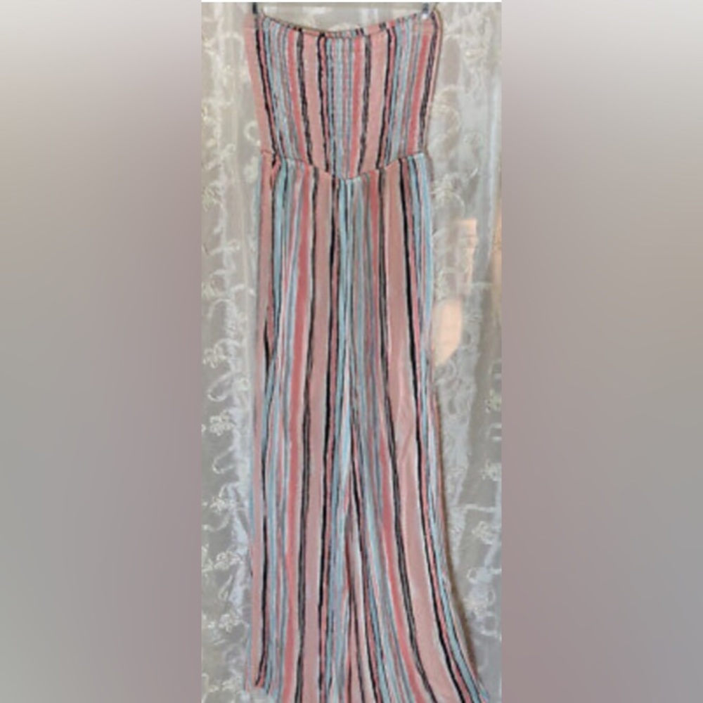 Tube top jump suit w/pockets size small never worn